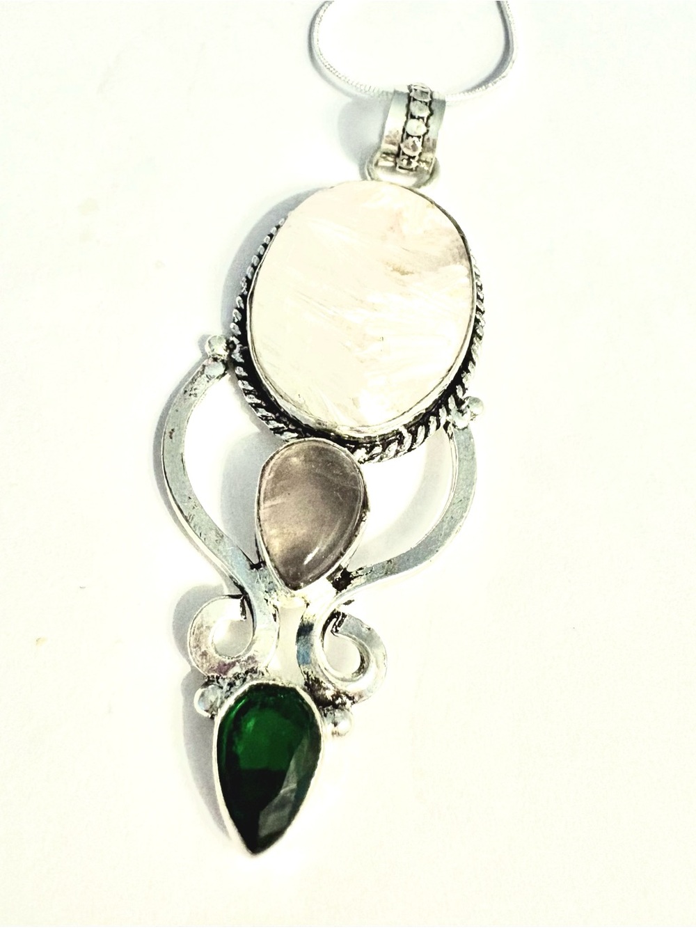 3 inch, 925 marked,Scolecite, Rose, Quartz and Peridot pendant on a silver chain